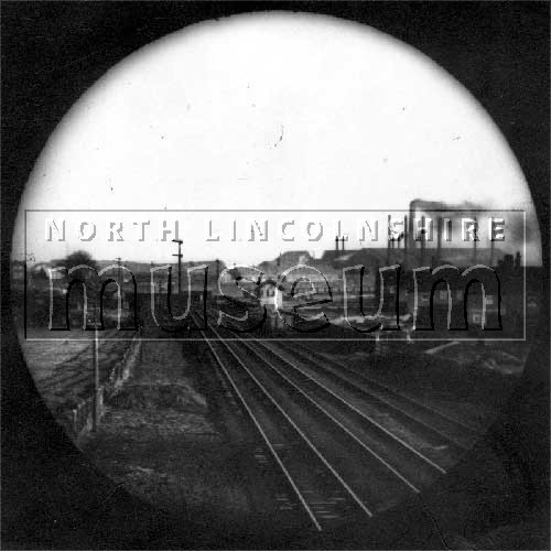 View of Railway Line looking east from Frodingham footpath, New Frodingham on right, Frodingham Works beyond c.1900	