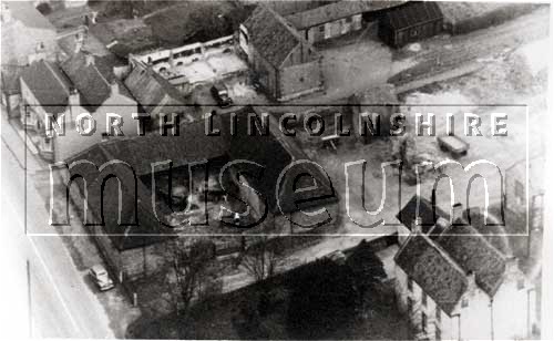 Aerial view of farm buildings next door to the Horn Inn on Messingham High Street, c.1950's 	