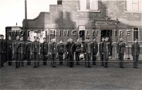 No. 6 Flight, 119 Squadron, Crowle Air Training Corps on parade in front of Crowle Police Station in 1942. 	