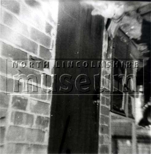 Back door of one of the terrace houses in New Frodingham, Scunthorpe, c.1963 	