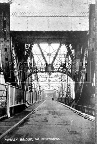 The road section of the King GeorgeV road and rail bridge at Keadby looking west from Gunness after 1916 	