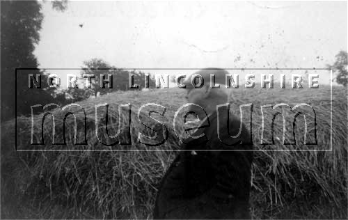 Mr George Whitehead in the stackyard of the former Manor Farm off Burringham Road, Scunthorpe, c.early 1950's 	