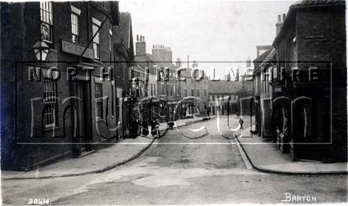 George Street, Barton-upon-Humber, looking north from Market Place. On the left is the George Hotel, an 18th Century coaching inn. 	