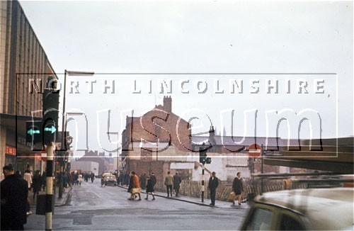 Scunthorpe High Street looking east during demolition work for the new shopping precinct, c.1968 	