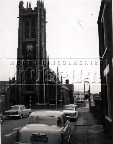 View of St. John's Church, Scunthorpe taken from Carlton Street looking east, in August 1966.	