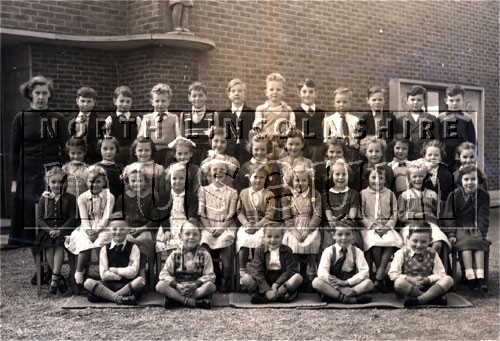 Class photograph taken outside Priory Lane County Primary School, Scunthorpe, in the early 1950's 	