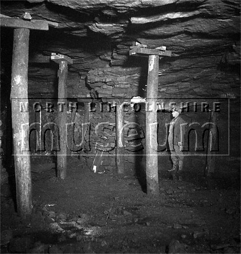 Scene underground at Santon ironstone mine, Scunthorpe, 26 January 1938 	