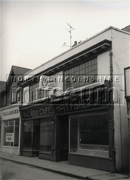 Tommy Fisher's butcher's shop at 72 Scunthorpe High Street during demolition to make way for the new shopping precinct in 1970 	