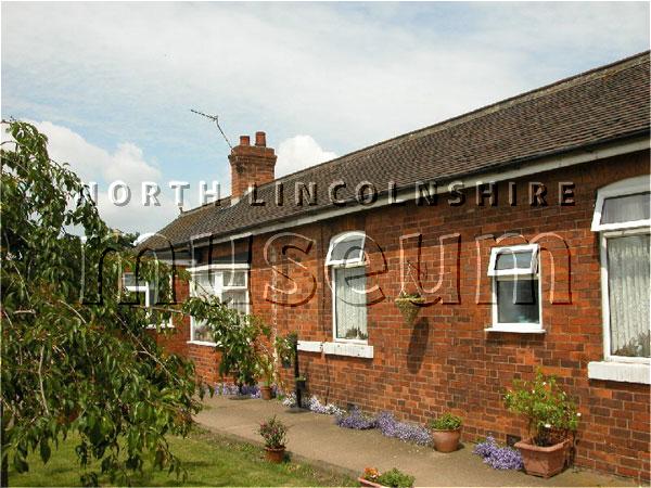 Record photograph of the former station building at Winteringham on the former North Lindsey Light Railway, now a farm, taken on 15 June 2006 	