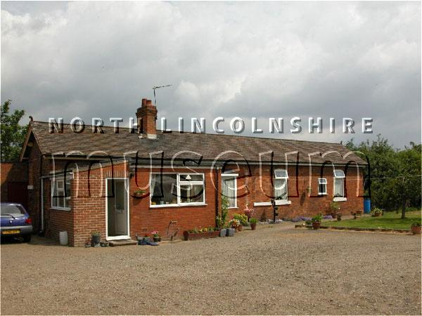 Record photograph of the former station building at Winteringham on the former North Lindsey Light Railway, now a farm, taken on 15 June 2006 	