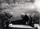 Gas exercise carried out by various Civilian services including St. John's Ambulance Brigade, A.R.P. and First Aid parties at New Holland during the Second World War in early 1940 	